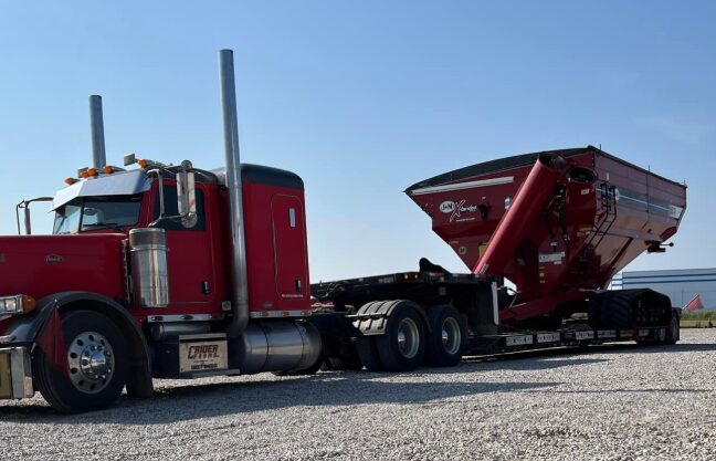 AG Motion hauling a grain wagon